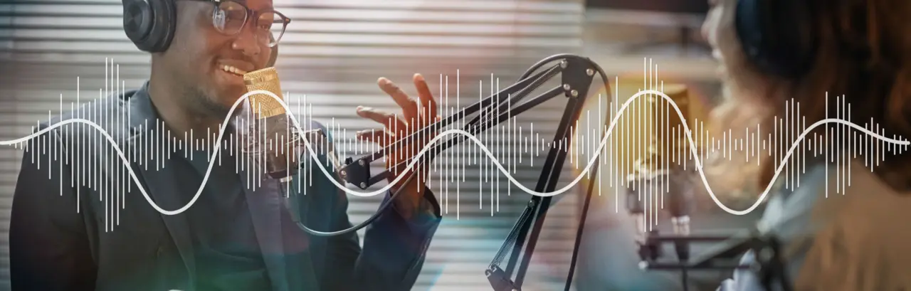 Cheerful Man in Headphones Speaking at Podcast
