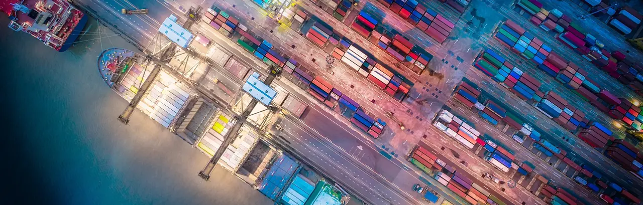 Overhead shot of a cargo ship at a port