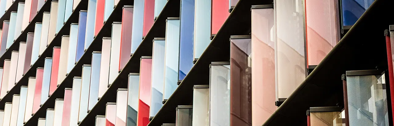 Abstract color image depicting ultra modern architecture with a facade of multi colored panels