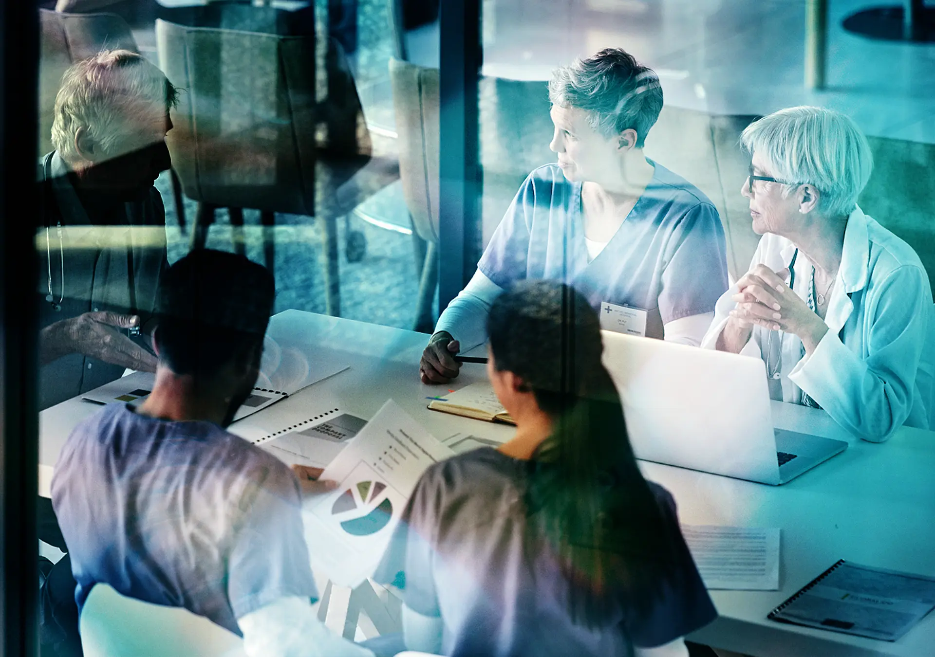 Shot of a group of medical professionals having a meeting together inside a boardroom at a hospital