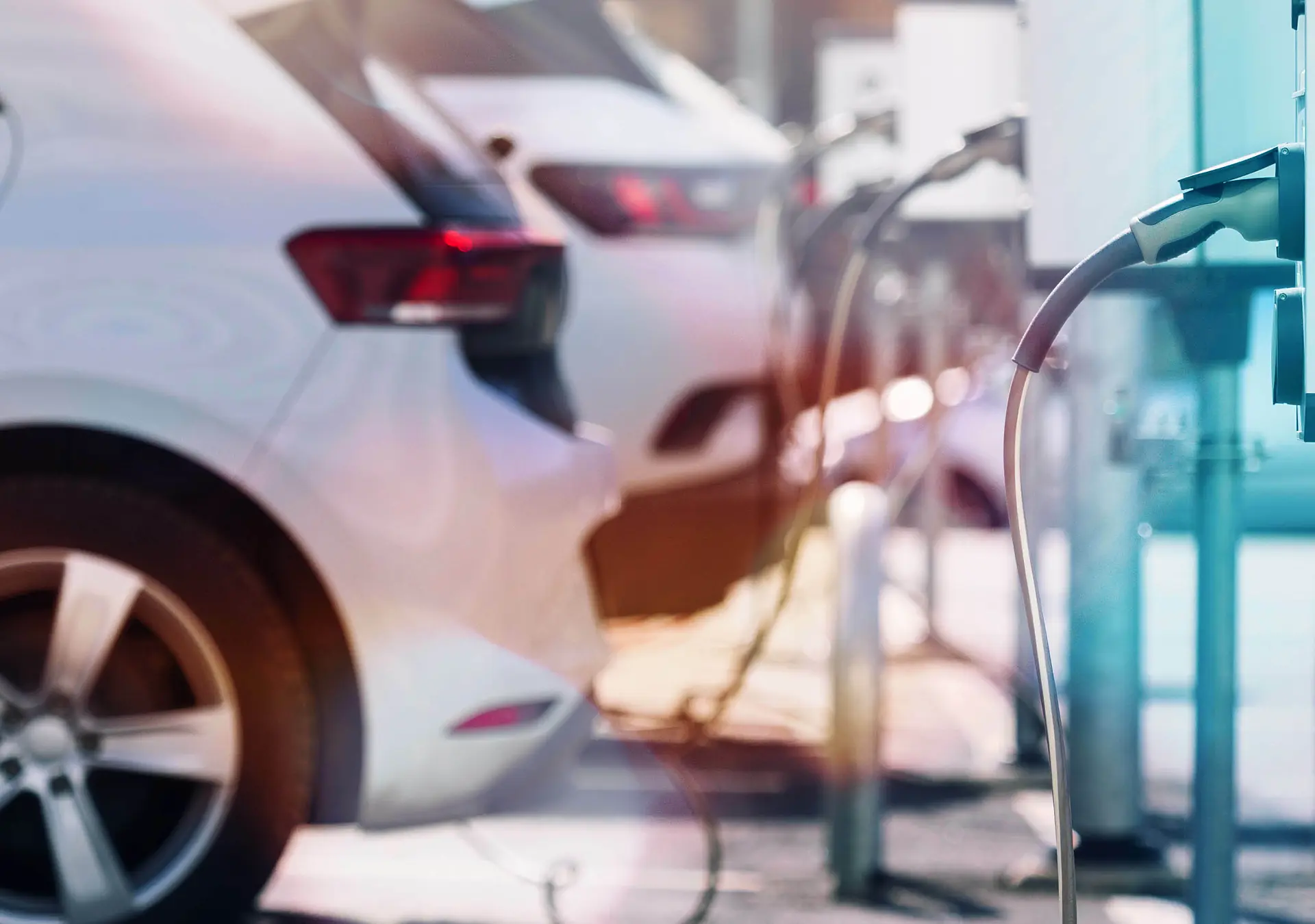A parking lot with charging stations for electric cars.