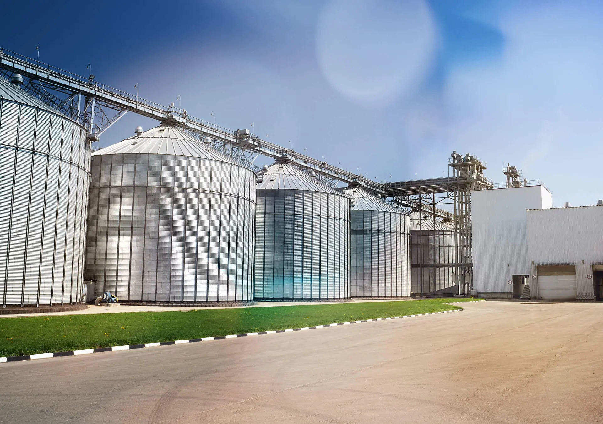 Big modern granary in sunny summer day.