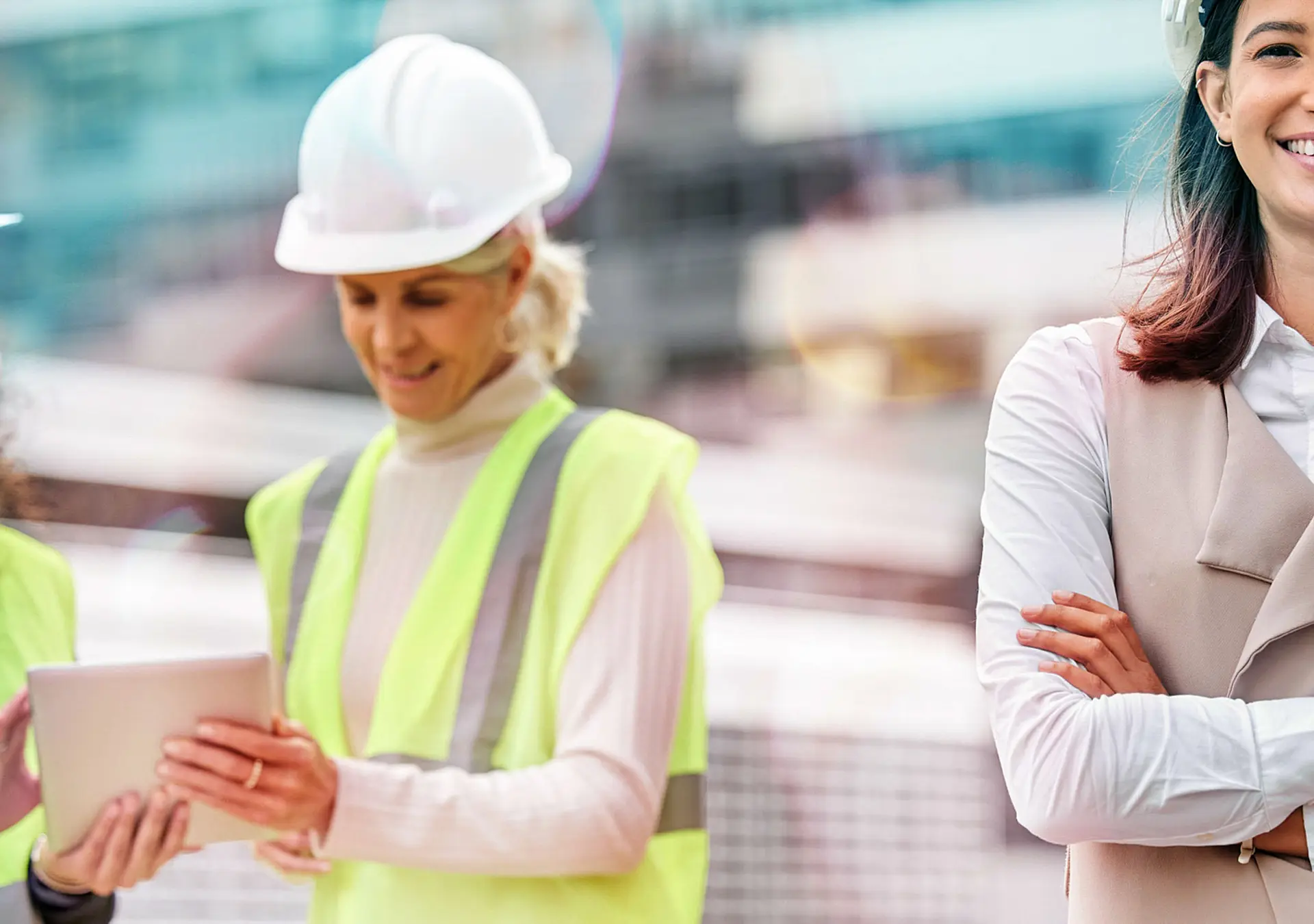 Cropped portrait of a young female engineer with her colleagues on a construction site