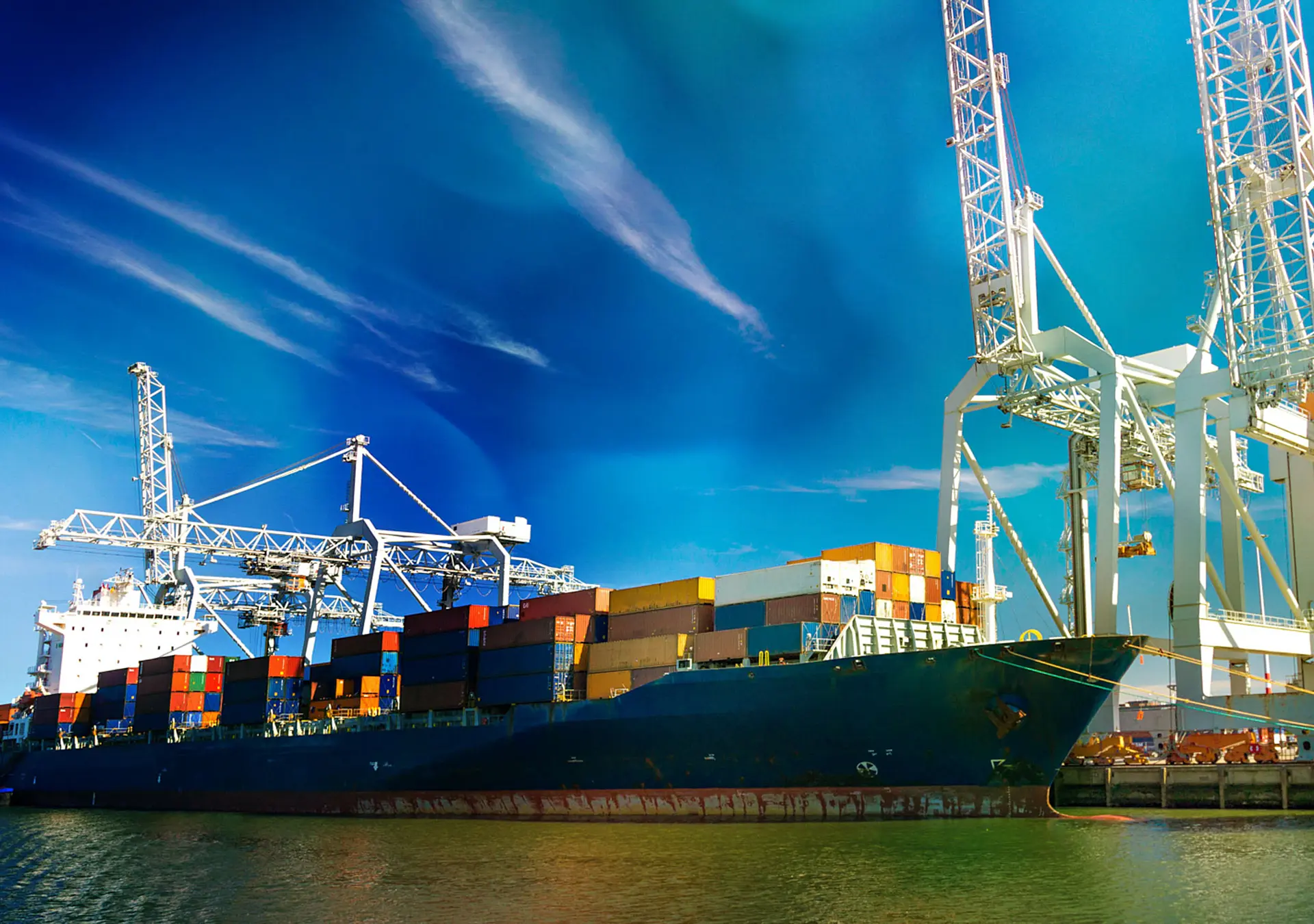 Large container vessel unloaded in Port of Rotterdam