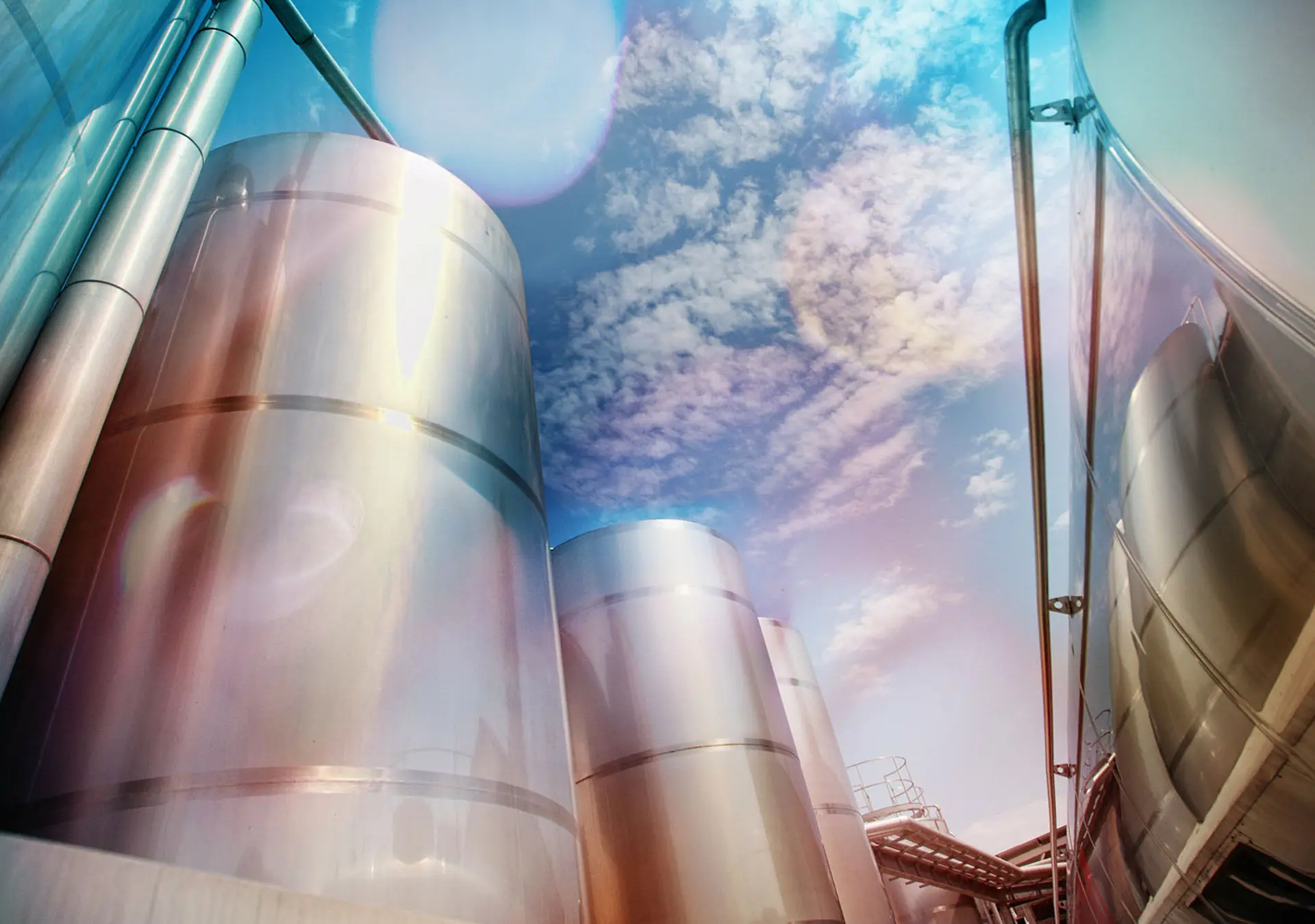 Silver silos and tank - industrial infrastructure