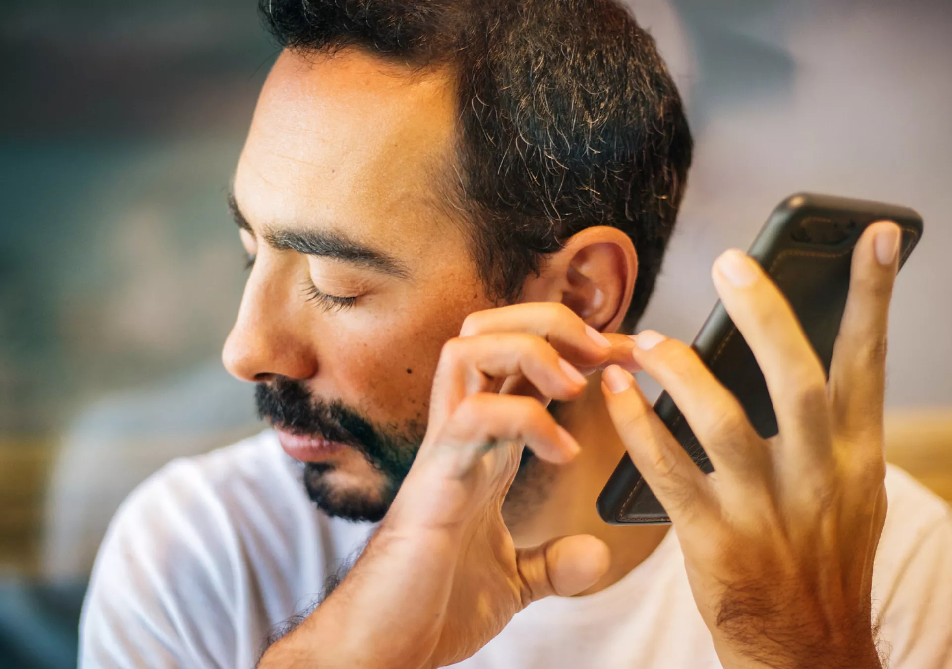 man using smartphone