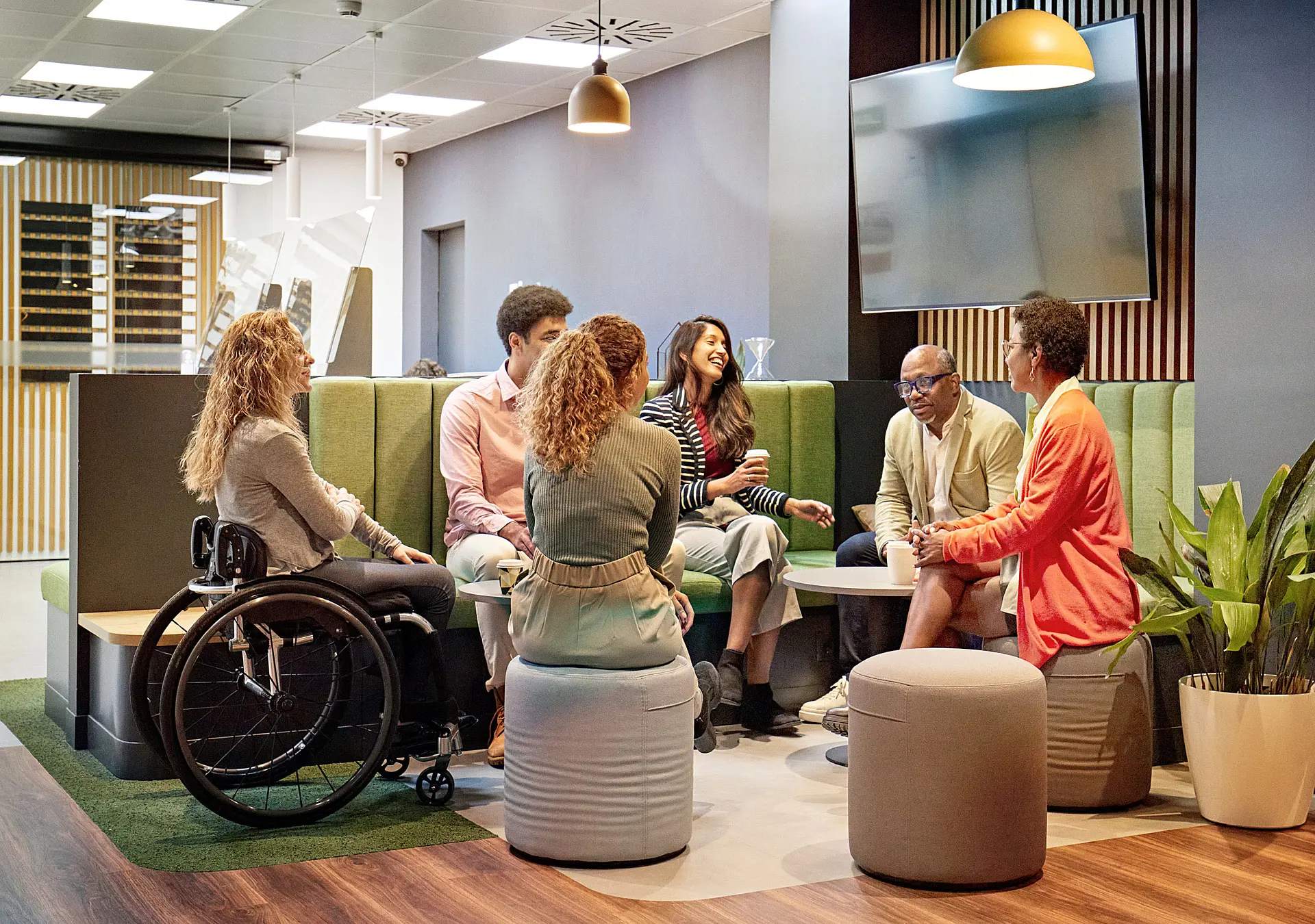 Business team meeting in modern office sitting area
