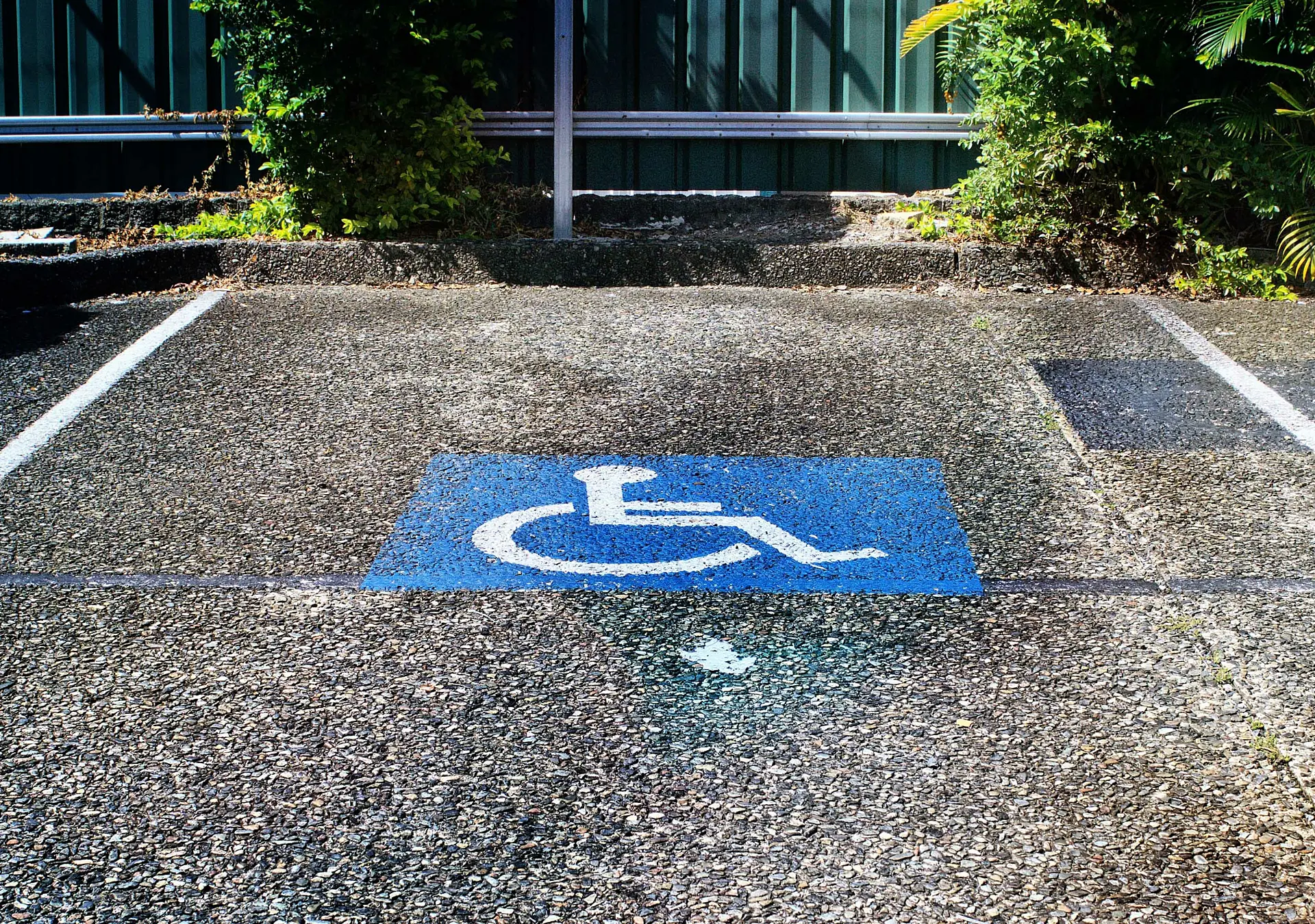 accessibility parking symbol painted on a parking spot