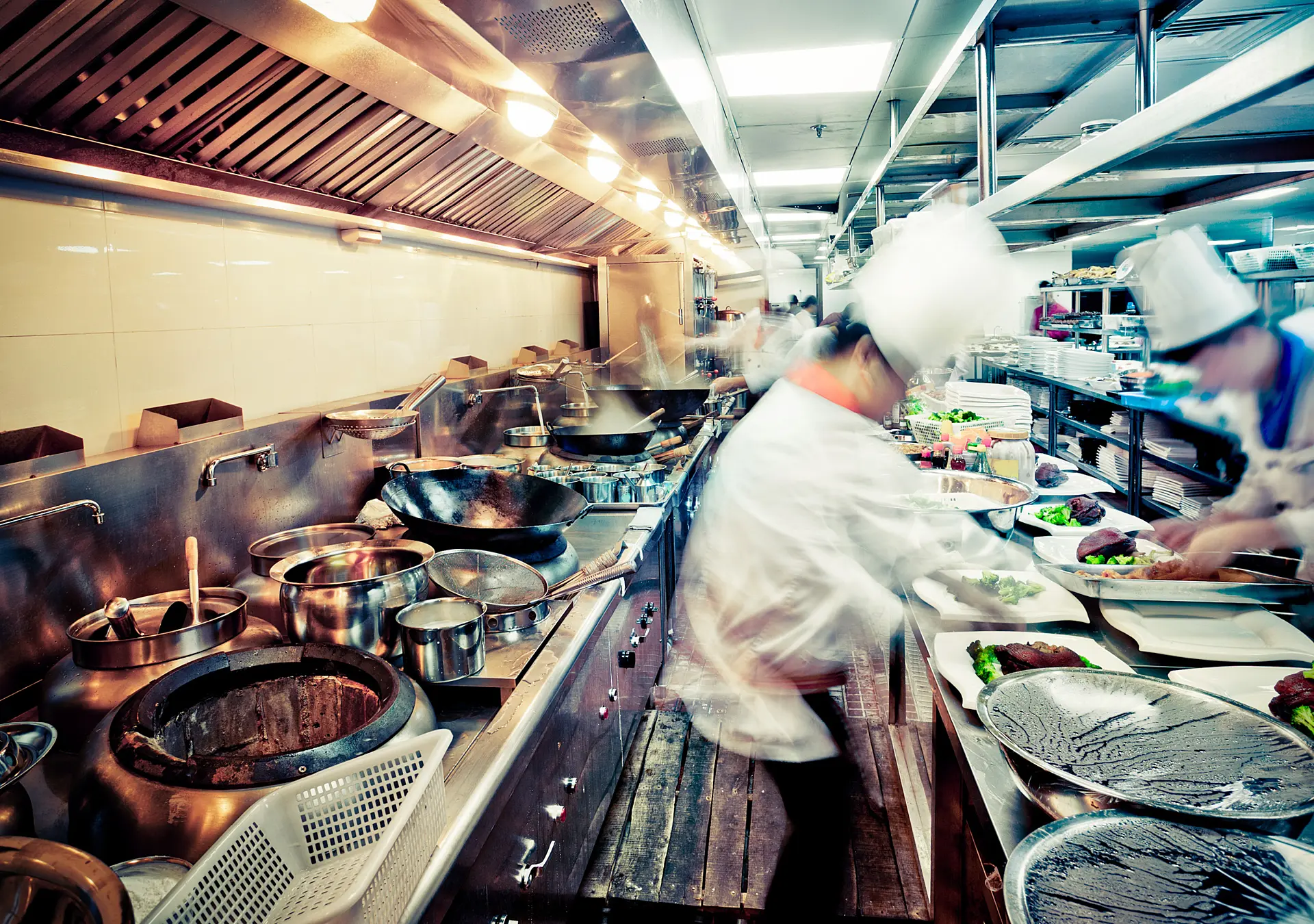motion chefs of a restaurant kitchen at china.