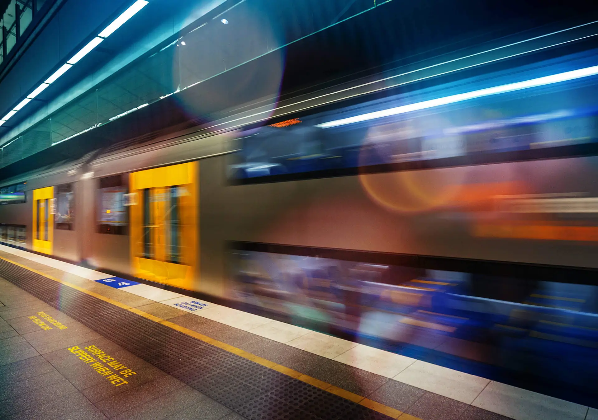 Subway platform - train in  motion
