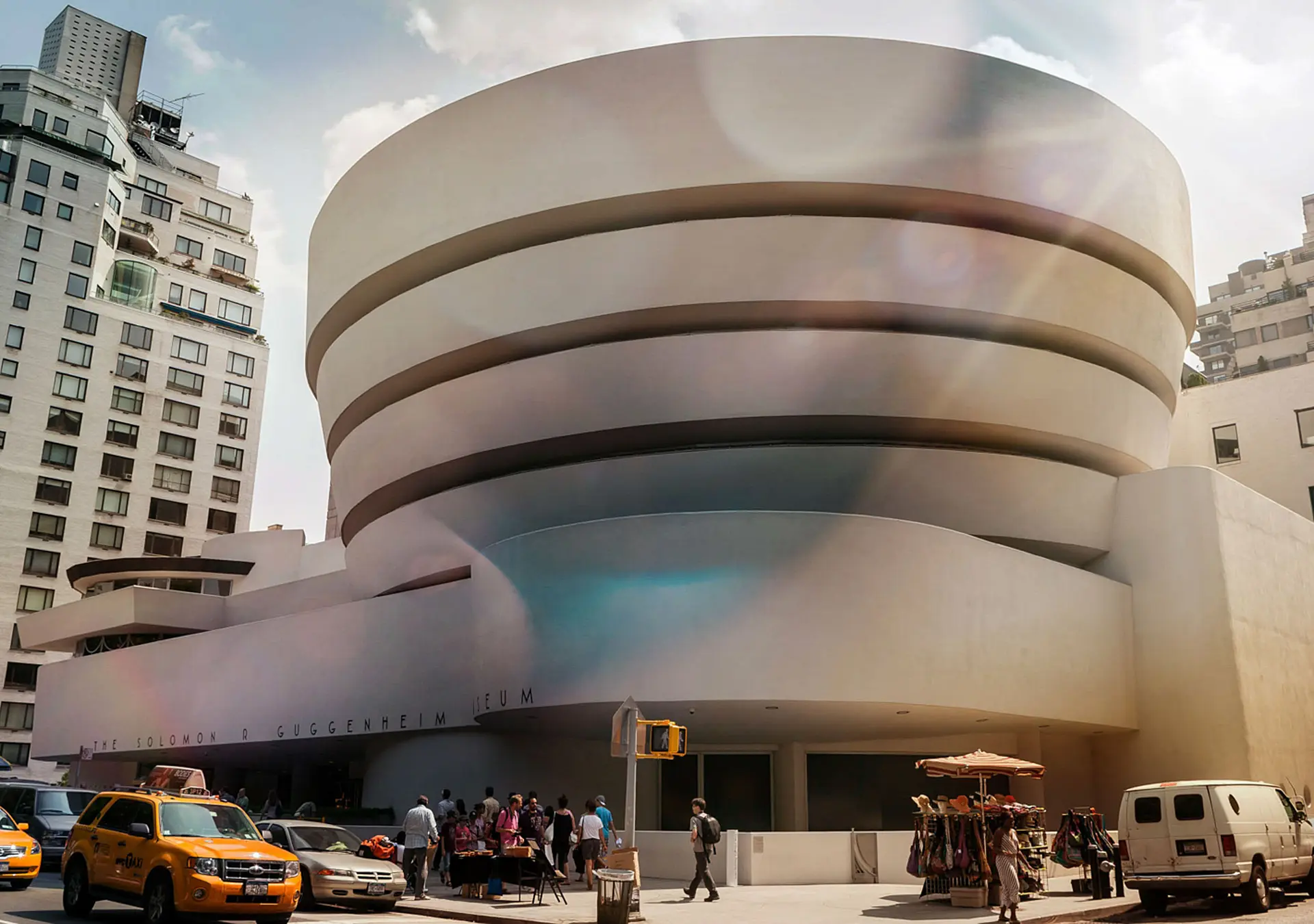 people walking near white concrete building during daytime