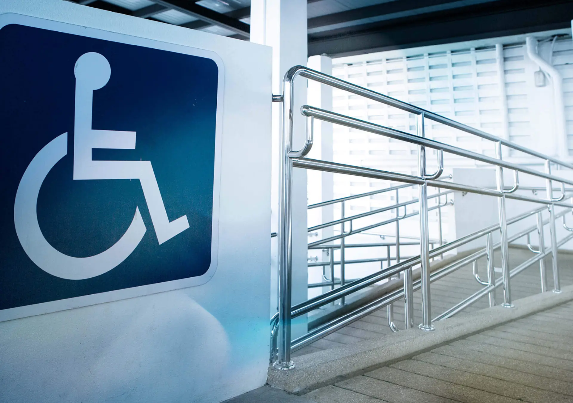 accessibility ramp with large sign