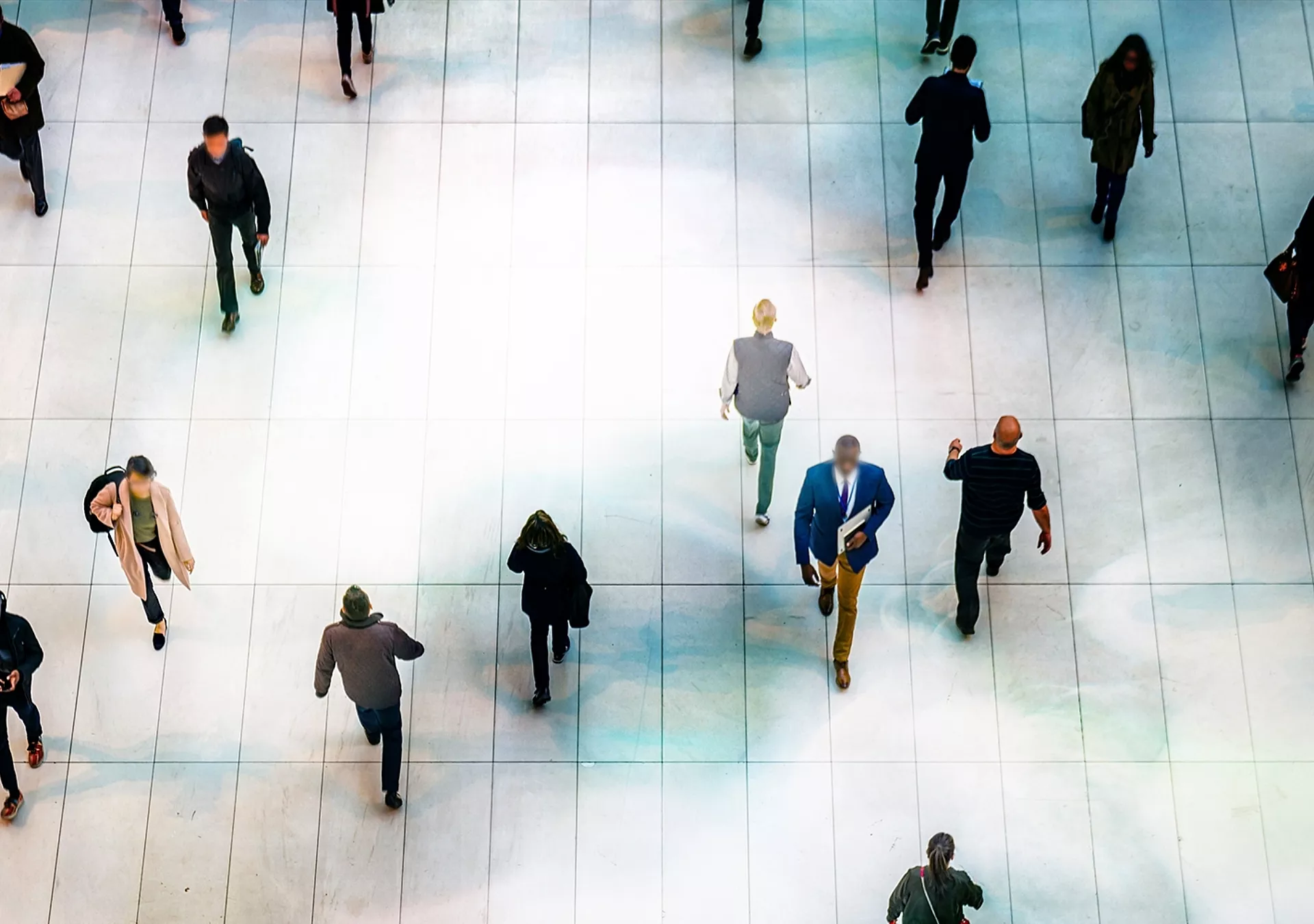 Top view people walking white floor or large crowd of anonymous people.