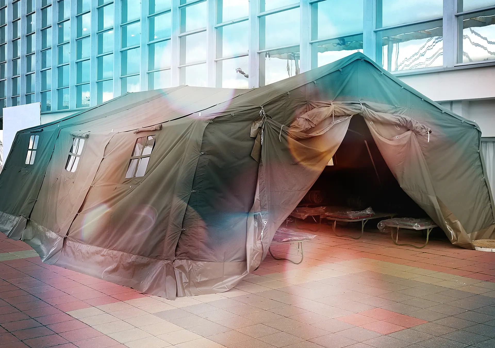Large heavy duty tent set up in a large indoor space