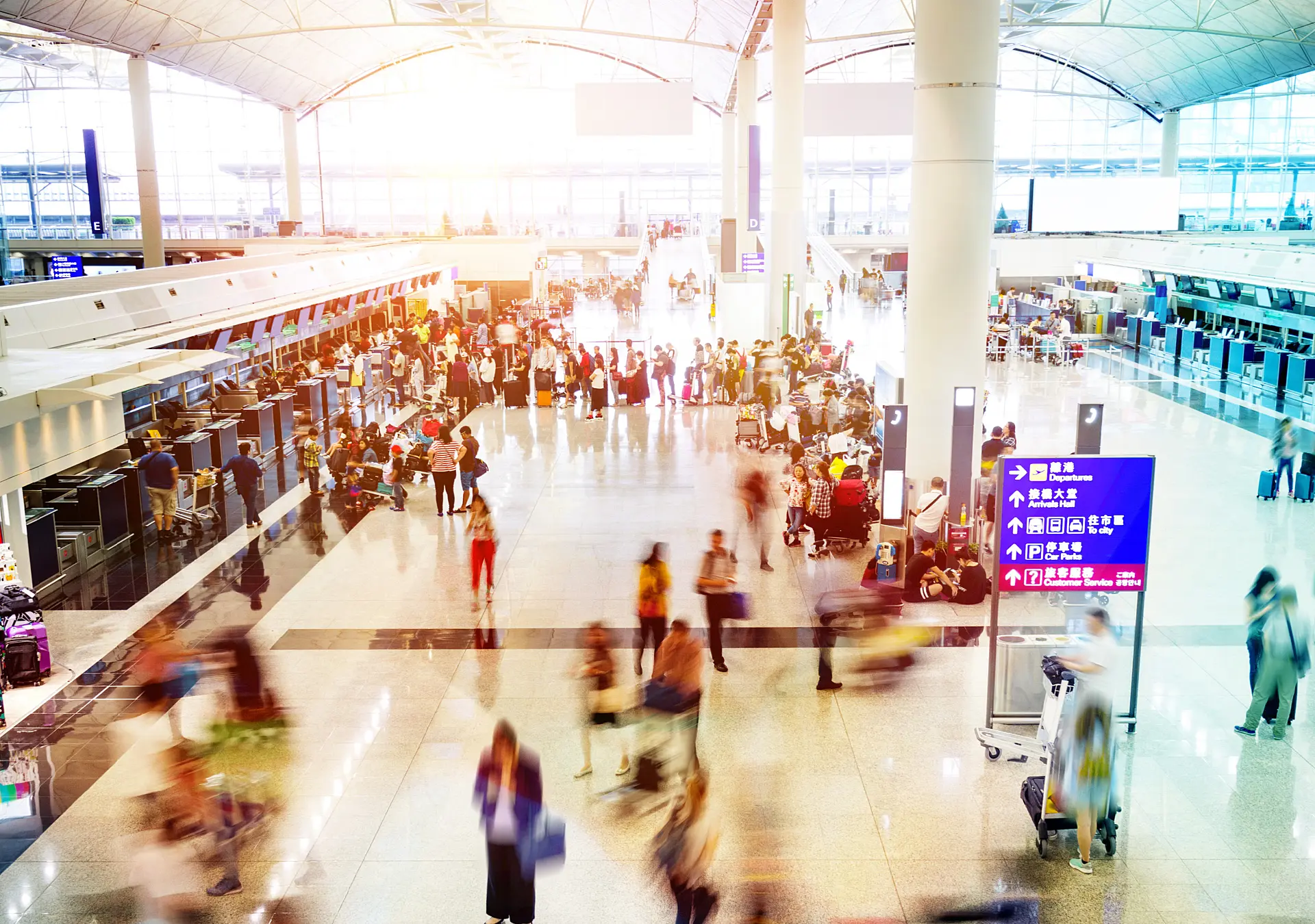 Crowd of people waiting for check-in.
