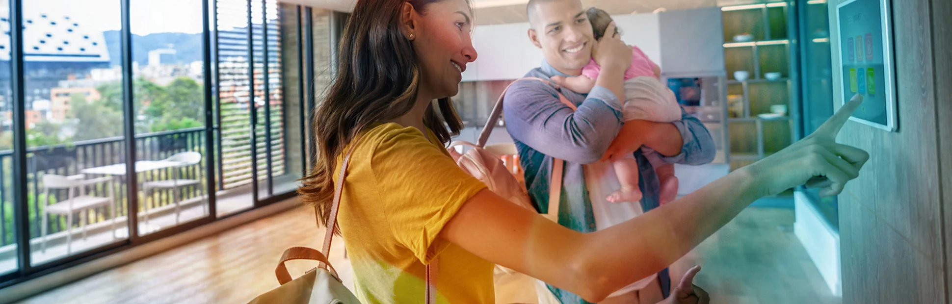 Happy family leaving the house locking the door using automated security system - smart home