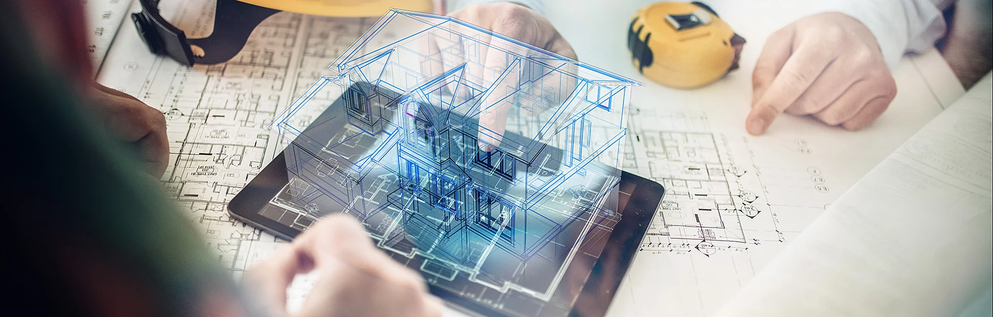 Rendered image of a 3D schematics of a house projecting from a tablet on the table