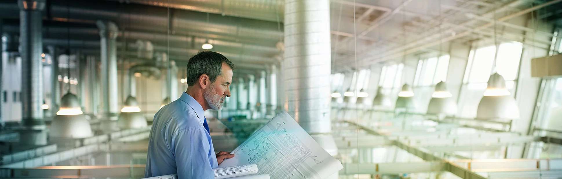 Architect viewing blueprints