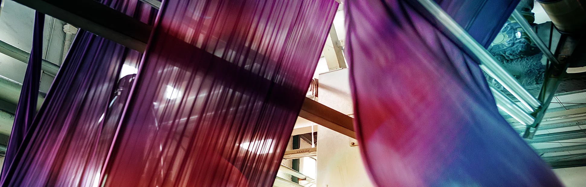 Fabric being processed at a textile plant.