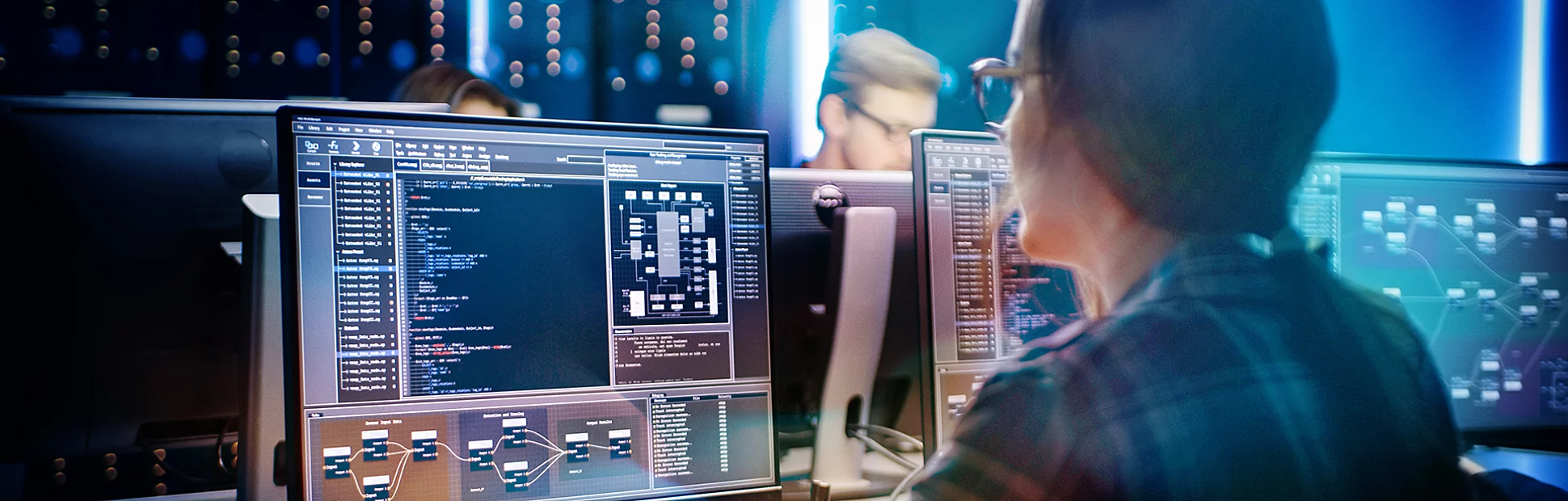Smart Female IT Programer Working on Desktop Computer in Data Center System Control Room.