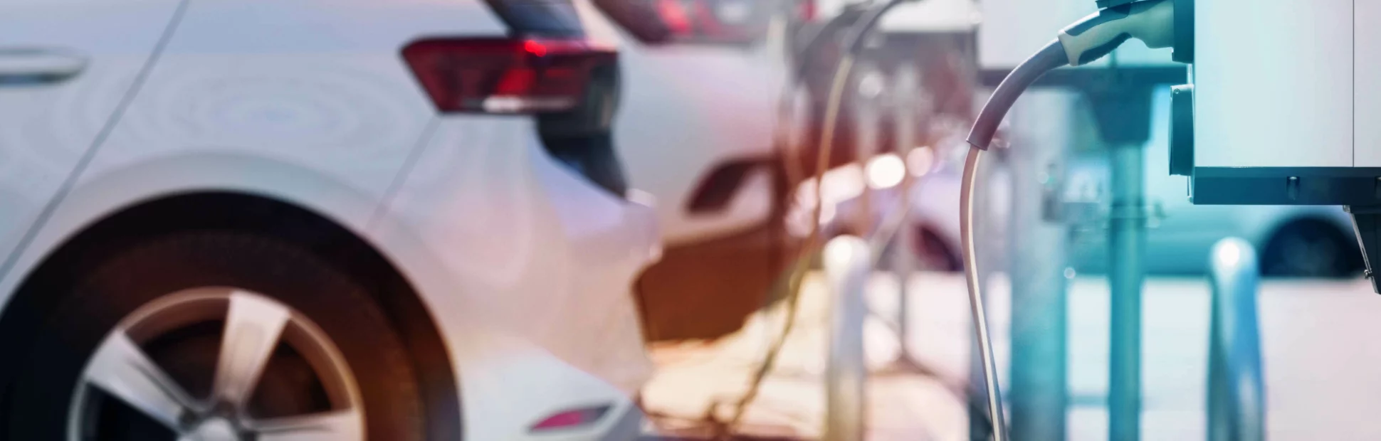 A parking lot with charging stations for electric cars.