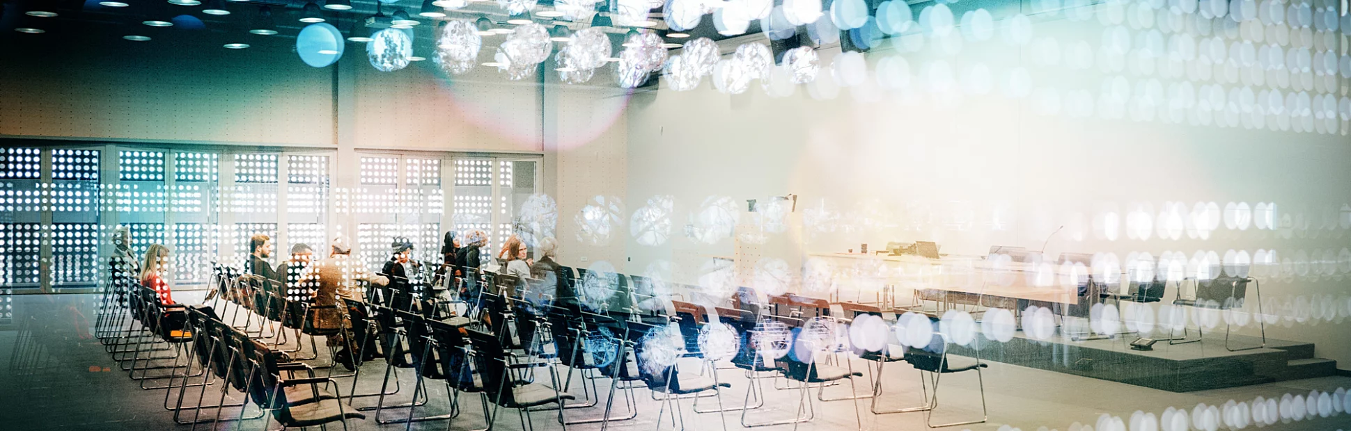 Abstract group of business people in the convention center.