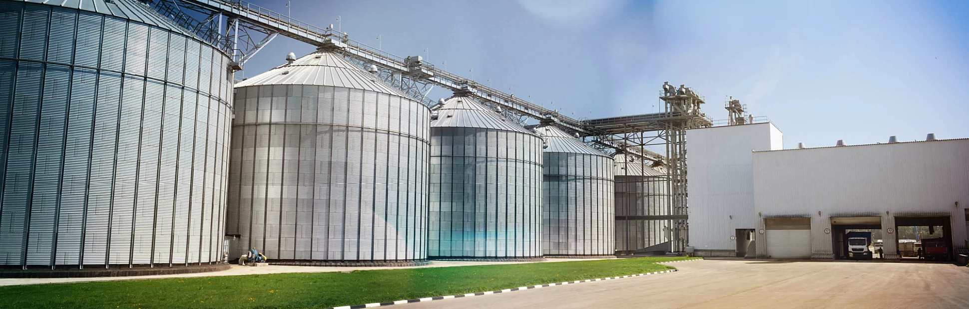 Big modern granary in sunny summer day.