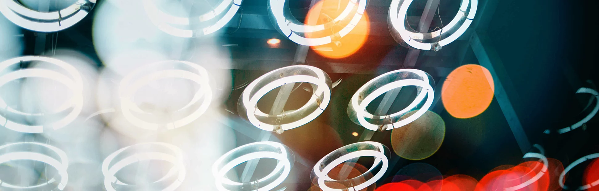 Abstract pattern and lights below a ceiling