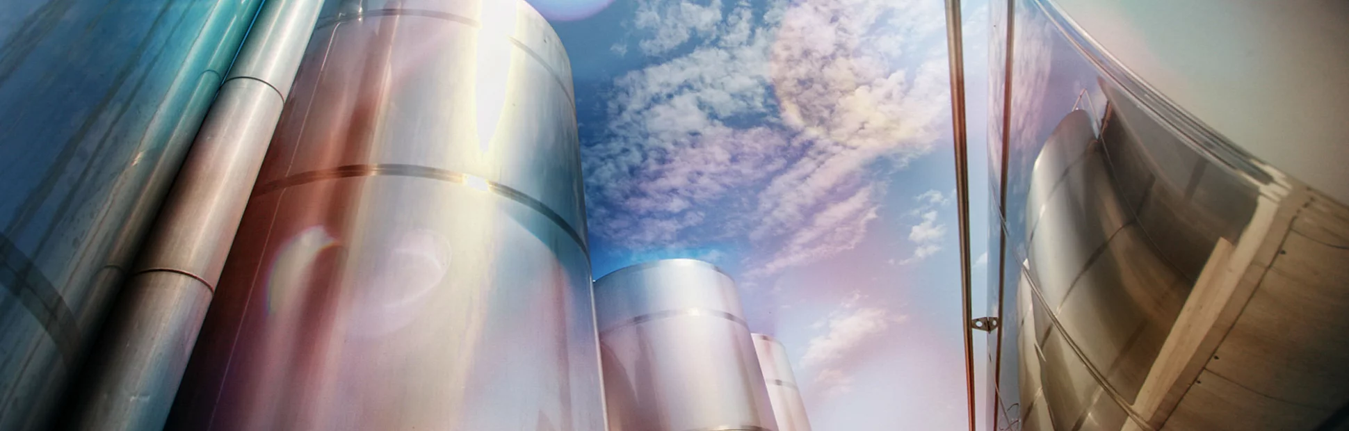 Silver silos and tank - industrial infrastructure