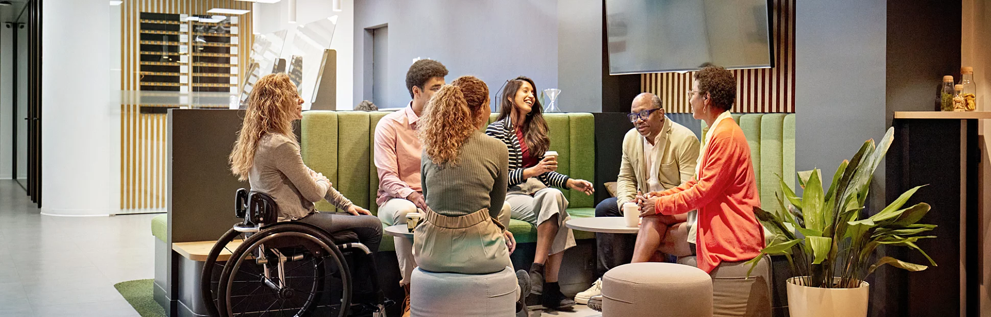 Business team meeting in modern office sitting area
