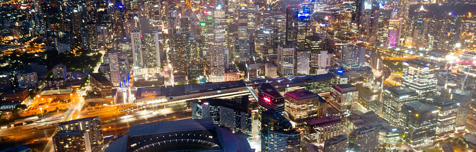 Melbourne Australia at night city skyline with stadium