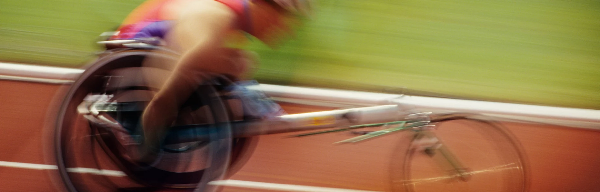 Wheelchair racer on track, side view