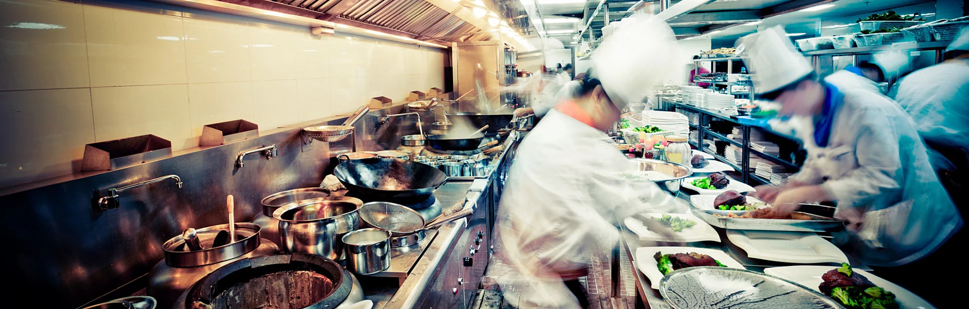 motion chefs of a restaurant kitchen at china.