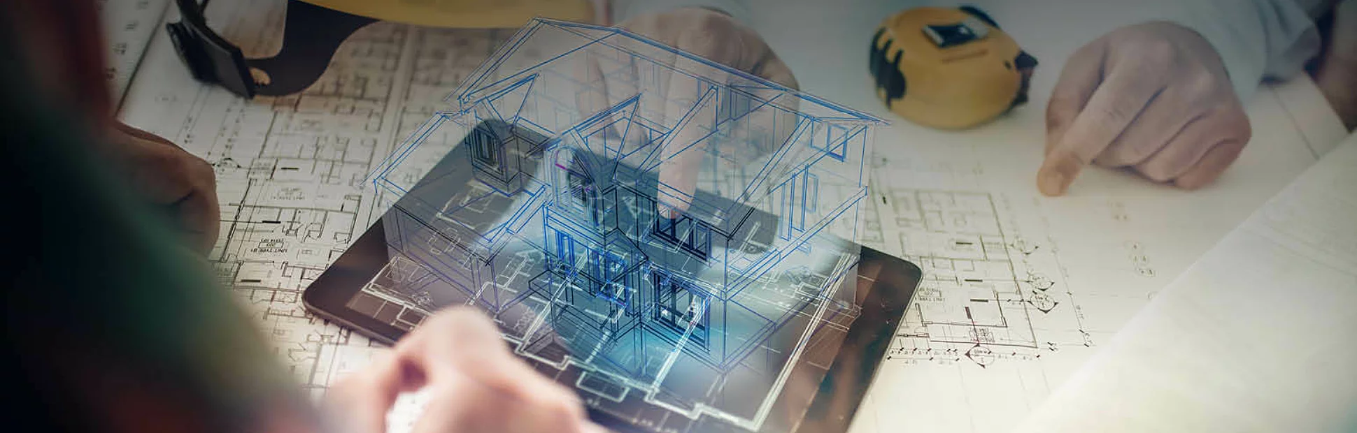 Architect and his client looking at the hologram of a house project over a tablet computer.