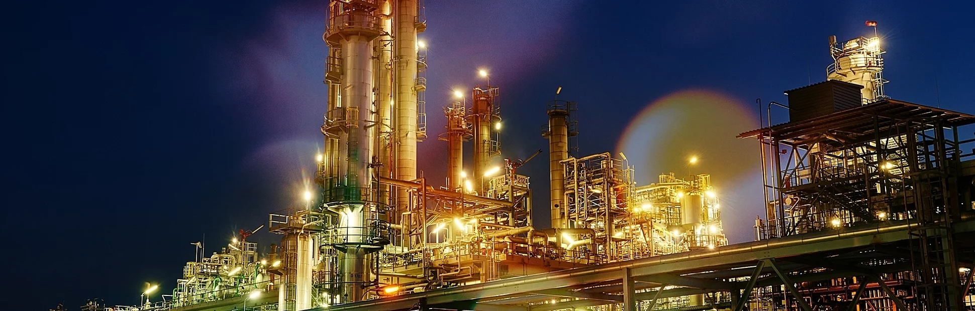 Save Download Preview Oil refinery plant of petroleum, petrochemical industry production at sunset