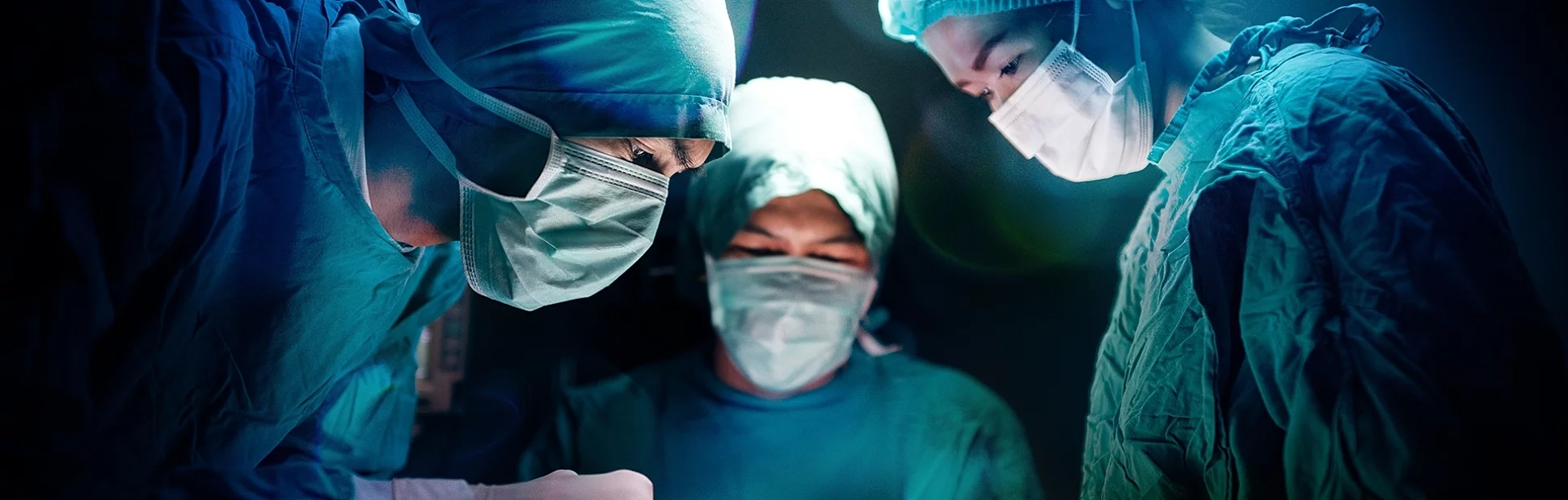 Surgical team working on a patient in operating theater