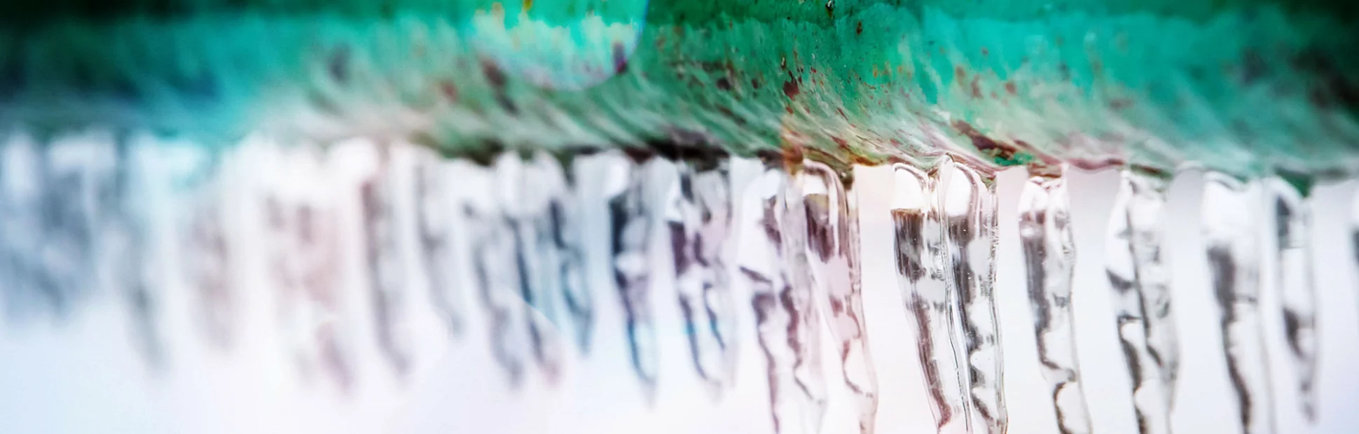 Frozen icy down pipe, icicles