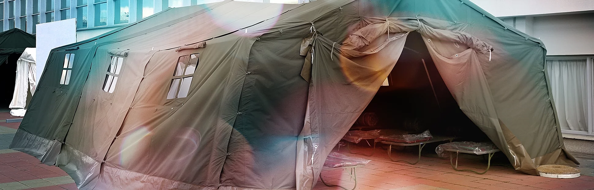 Large heavy duty tent set up in a large indoor space