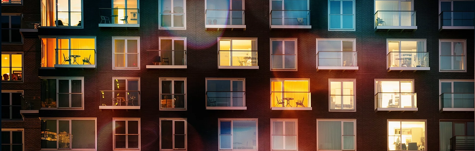 Modern apartment block at dusk themes of urban scene apartment housing