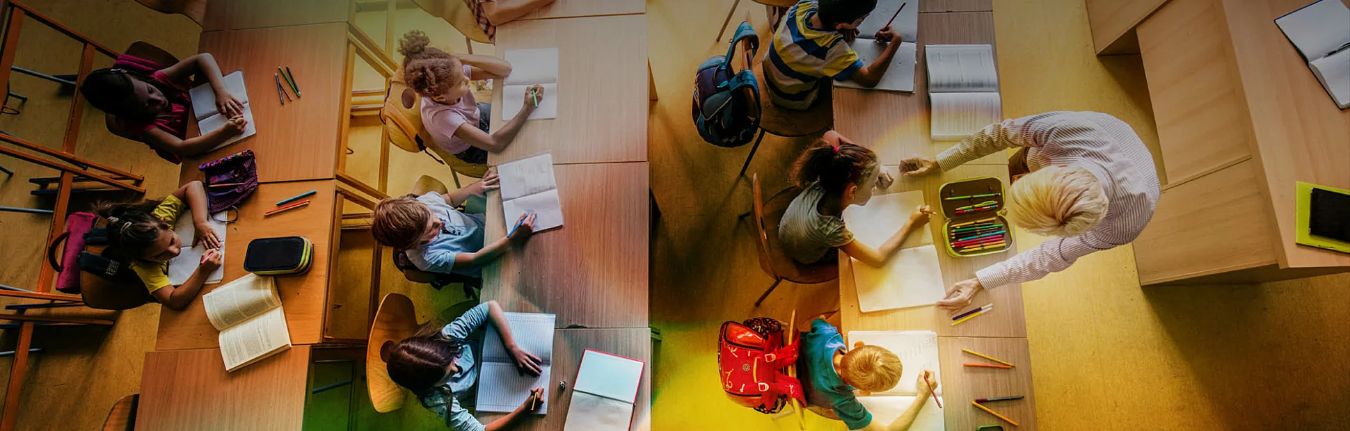 High angle view of large group of elementary students having a class in the classroom
