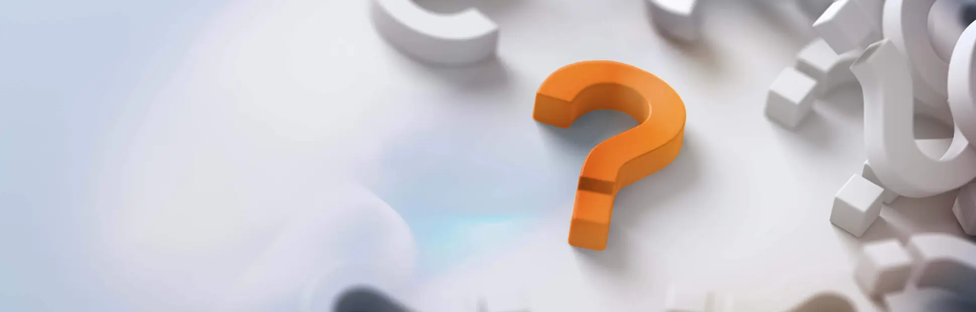 Yellow question mark standing out from the crowd of gray and white question marks in a cluster