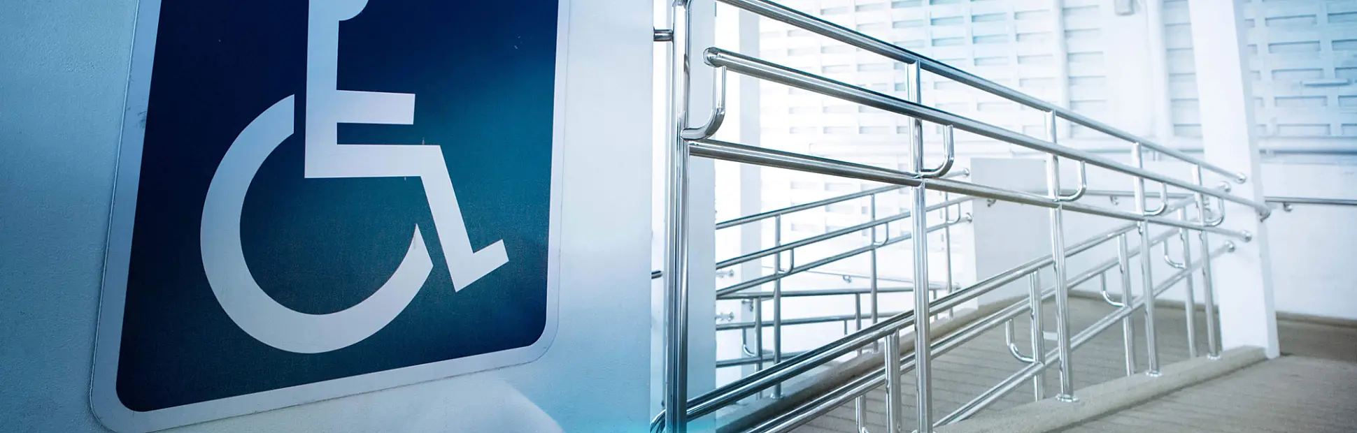 accessibility ramp with large sign