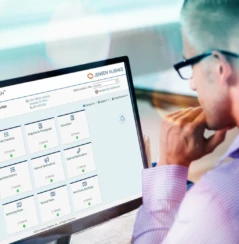 man on computer using the SMARTPLAN digital platfrom