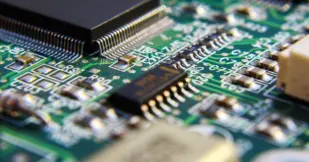 Printed Circuit Board with many electrical components.