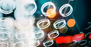 Abstract pattern and lights below a ceiling