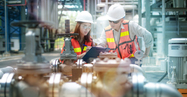 two engineer provide safety inspection as team work to ensure process problem can be solved properly