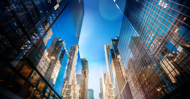 Futuristic skyscrapers in Midtown Manhattan on a sunny day.