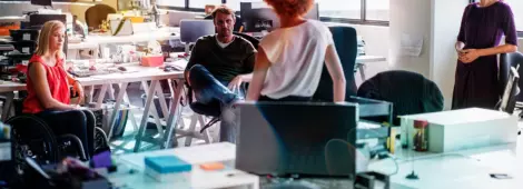 A photo of a creative business team having a discussion in meeting.