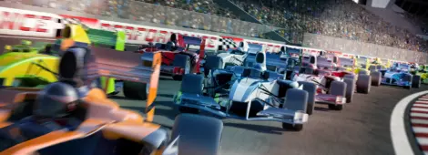 Racing cars speeding down around a bend in the track in front of a stadium filled with people.