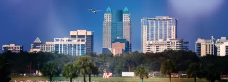 Clear blue sky with a view of the Orlando International Airport.